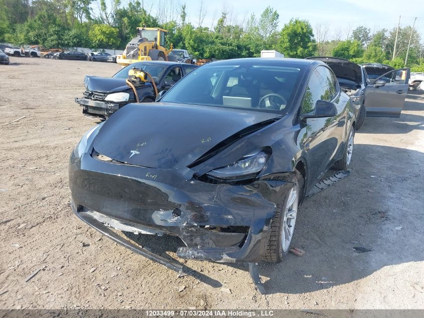 2023 Tesla Model Y VIN: LRWYGDEE1PC267003 Lot: 12033499