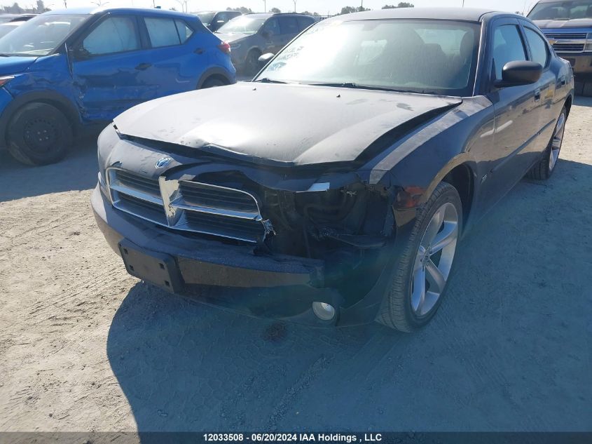 2009 Dodge Charger Sxt VIN: 2B3KA33V19H522970 Lot: 12033508