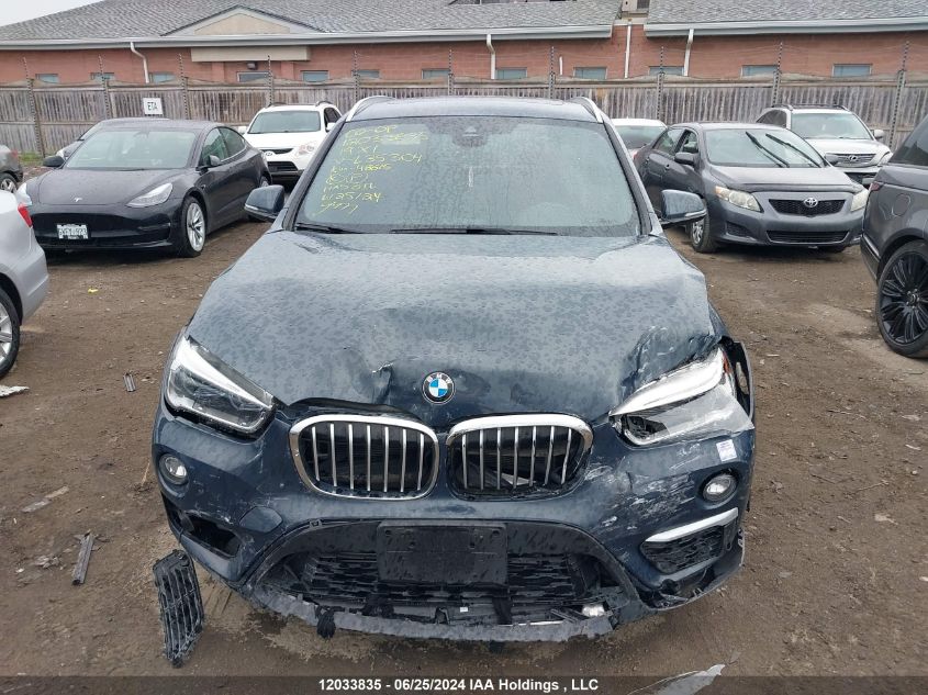 2019 BMW X1 VIN: WBXHT3C50K5L35304 Lot: 12033835