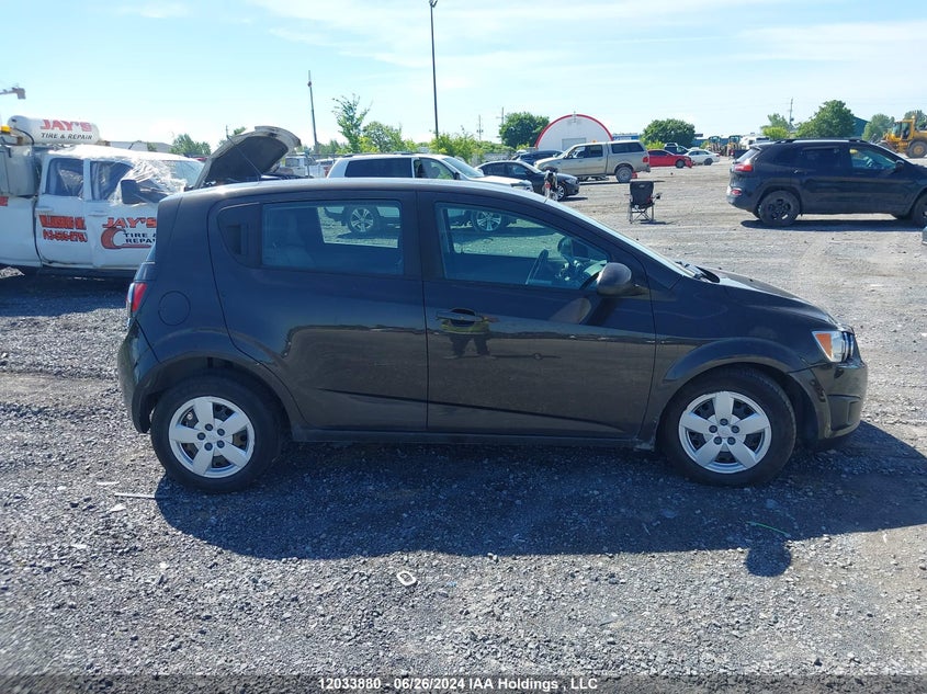 2014 Chevrolet Sonic Ls VIN: 1G1JA6EH0E4192211 Lot: 12033880