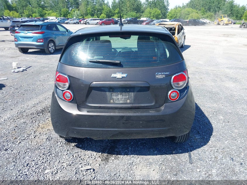 2014 Chevrolet Sonic Ls VIN: 1G1JA6EH0E4192211 Lot: 12033880