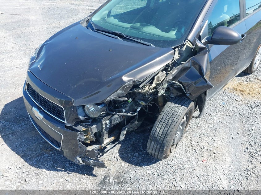 2014 Chevrolet Sonic Ls VIN: 1G1JA6EH0E4192211 Lot: 12033880