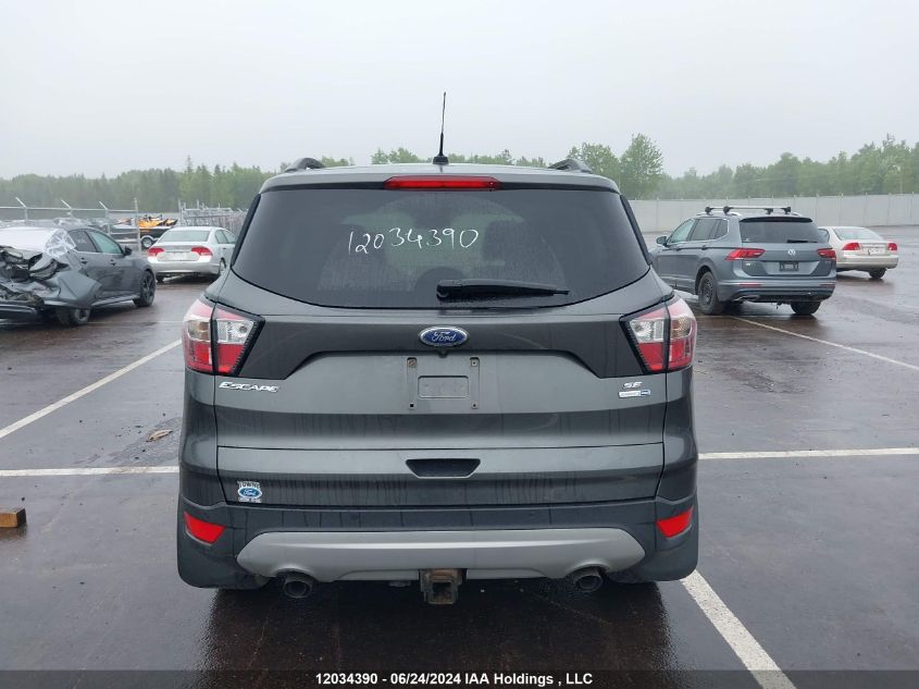 2017 Ford Escape Se VIN: 1FMCU9G98HUE79780 Lot: 12034390