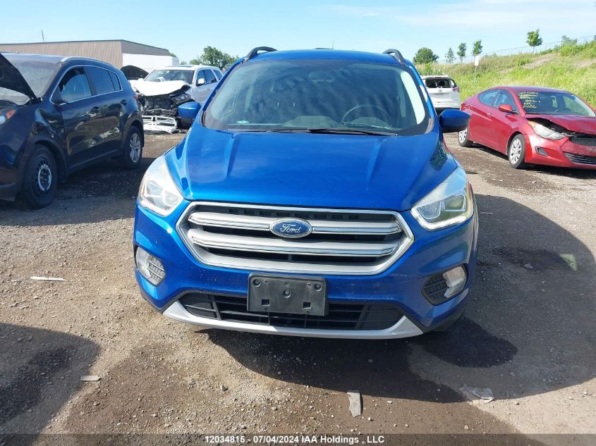 2017 Ford Escape Se VIN: 1FMCU9GD6HUE11238 Lot: 12034815