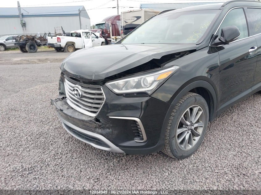 2017 Hyundai Santa Fe Se/Limited VIN: KM8SNDHF7HU186341 Lot: 12034949