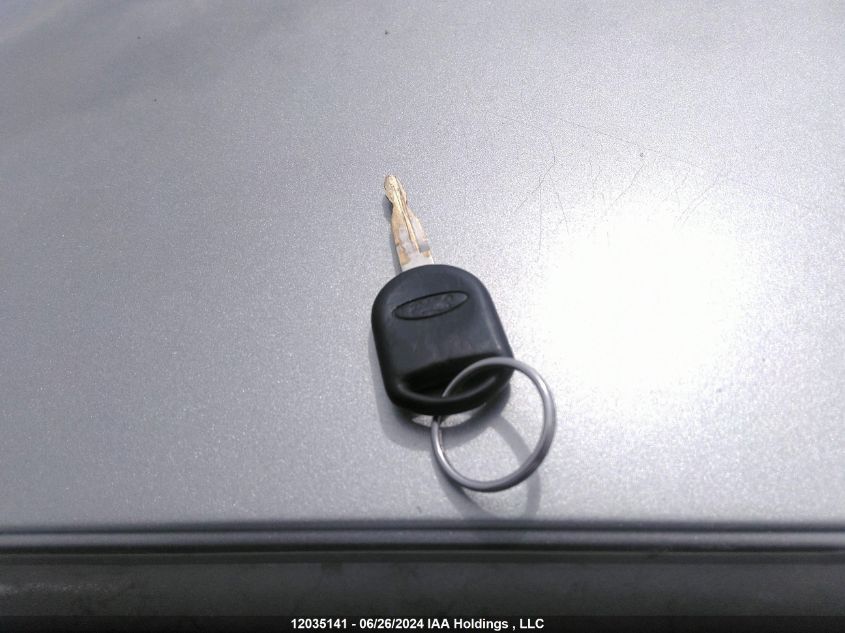 2008 Ford Focus VIN: 1FAHP34N58W290871 Lot: 12035141