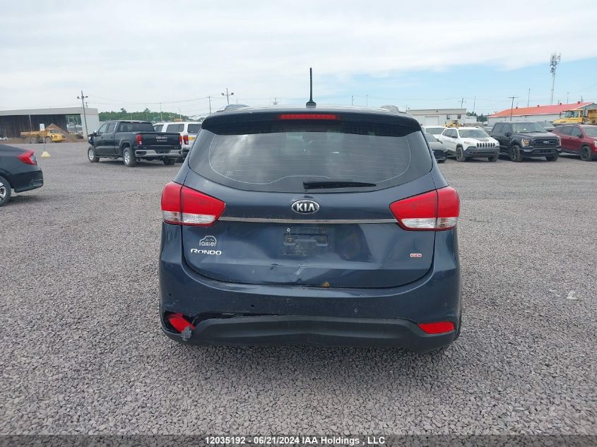 2014 Kia Rondo VIN: KNAHU8A32E7068648 Lot: 12035192