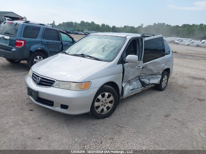 2003 Honda Odyssey VIN: 2HKRL18683H013275 Lot: 12035204