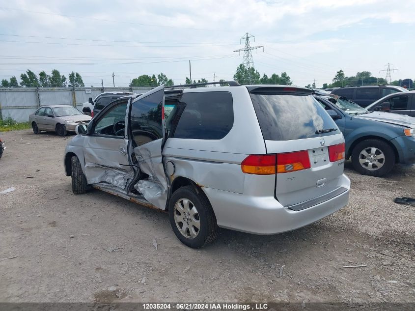 2003 Honda Odyssey VIN: 2HKRL18683H013275 Lot: 12035204