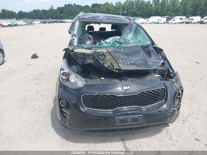 2017 Kia Sportage VIN: KNDPMCAC4H7148765 Lot: 12036520