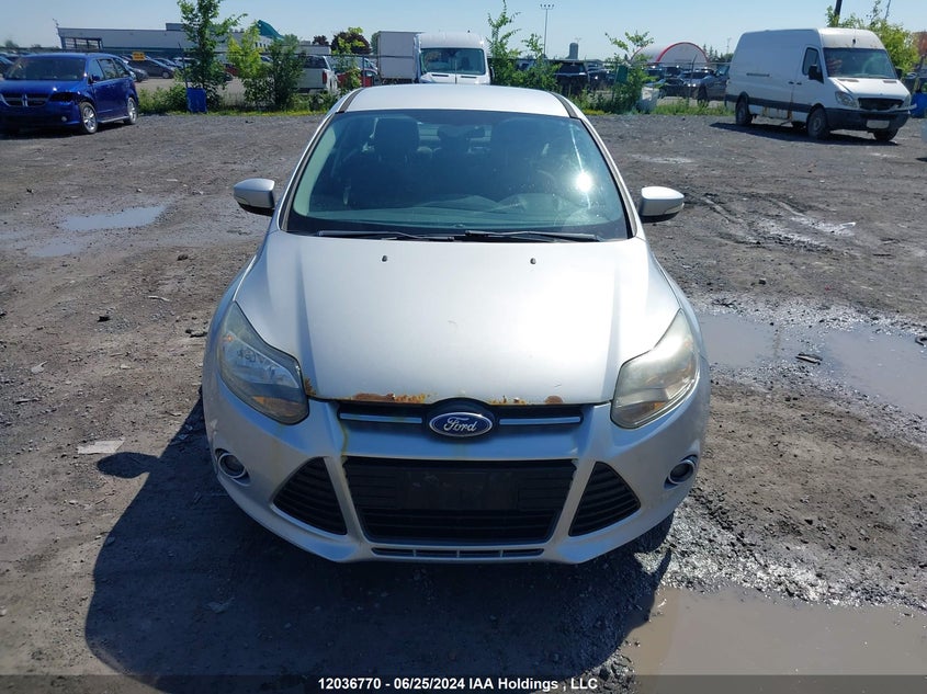 2012 Ford Focus Titanium VIN: 1FAHP3J22CL136459 Lot: 12036770
