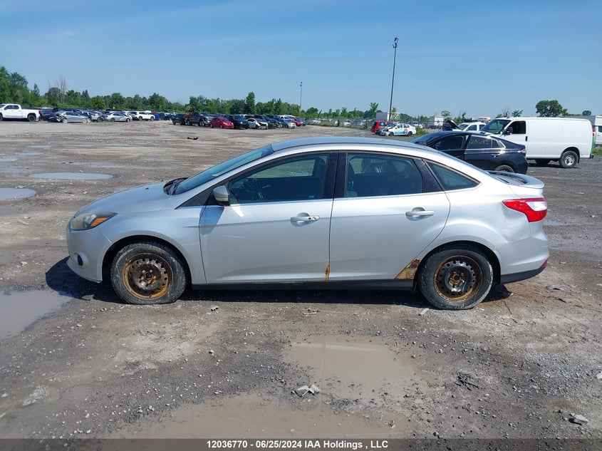 2012 Ford Focus Titanium VIN: 1FAHP3J22CL136459 Lot: 12036770