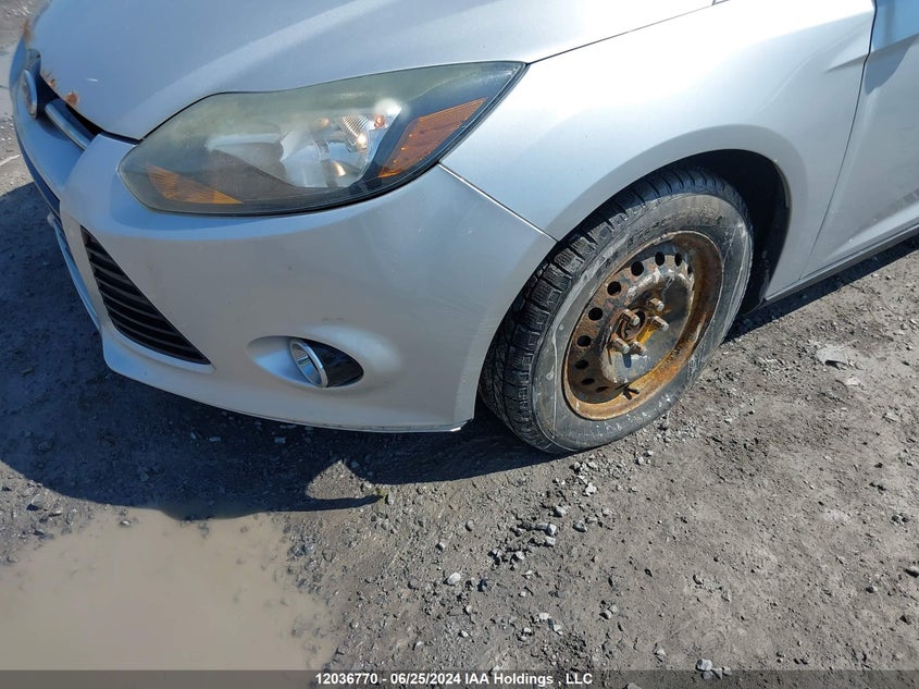 2012 Ford Focus Titanium VIN: 1FAHP3J22CL136459 Lot: 12036770