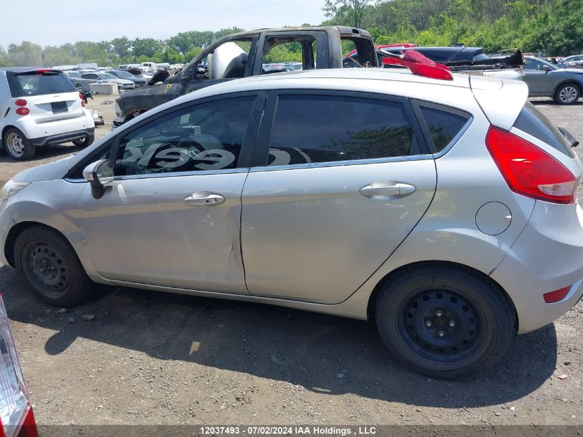 2011 Ford Fiesta Ses VIN: 3FADP4FJXBM188679 Lot: 12037493