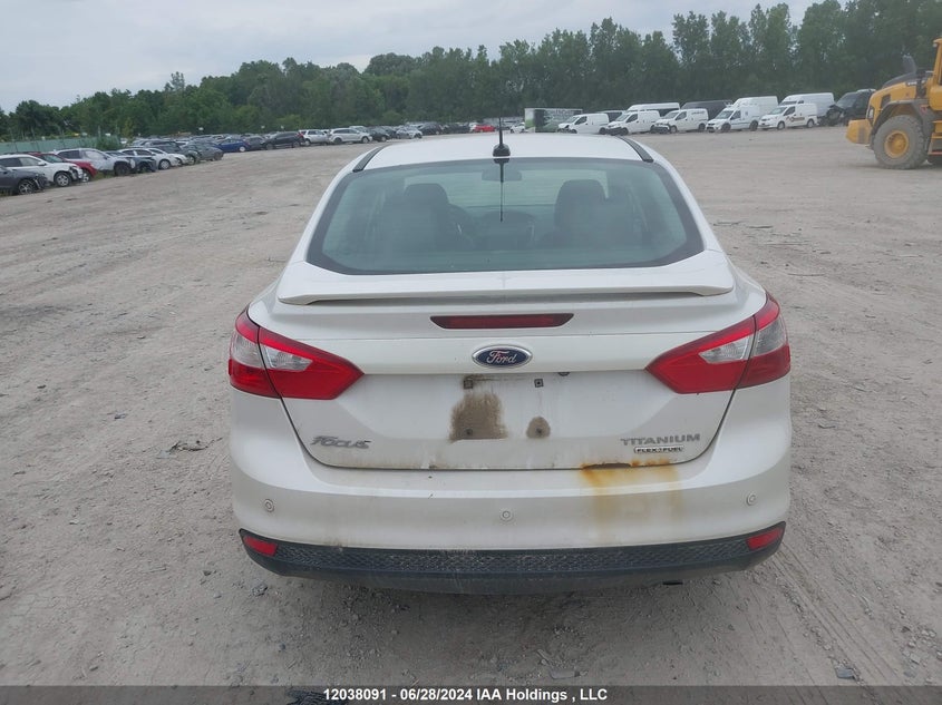 2013 Ford Focus Titanium VIN: 1FADP3J29DL345908 Lot: 12038091
