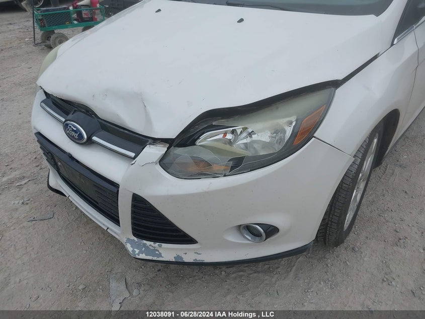 2013 Ford Focus Titanium VIN: 1FADP3J29DL345908 Lot: 12038091
