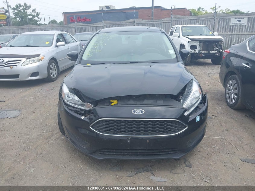 2018 Ford Focus Se VIN: 1FADP3F22JL253513 Lot: 12038681
