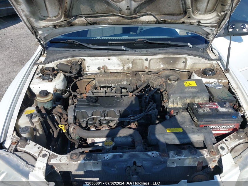 2001 Hyundai Accent VIN: KMHCG35G41U153325 Lot: 12038801