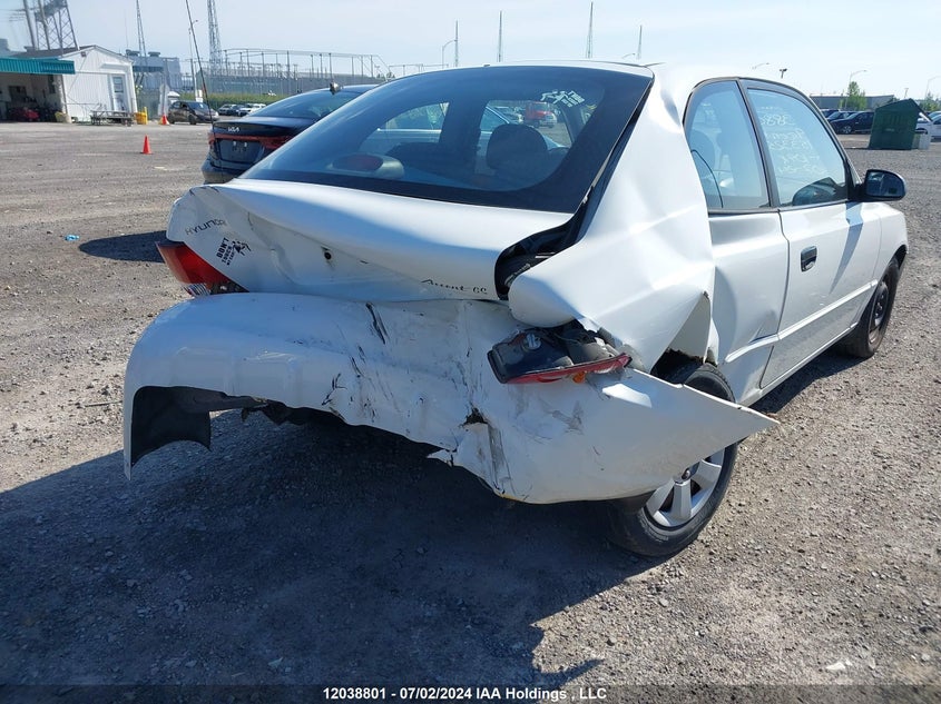 2001 Hyundai Accent VIN: KMHCG35G41U153325 Lot: 12038801