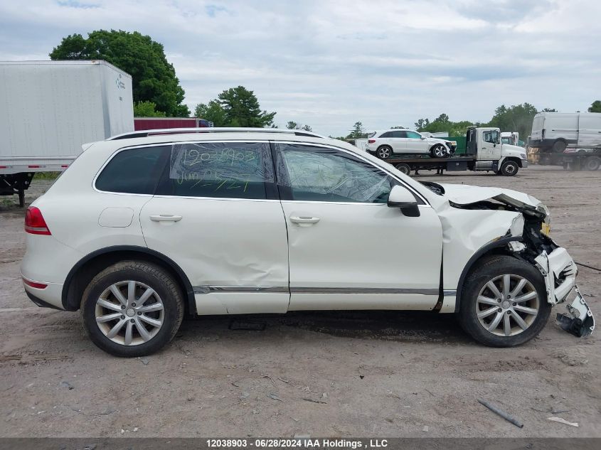 2011 Volkswagen Touareg V6 VIN: WVGFF9BP2BD002024 Lot: 12038903