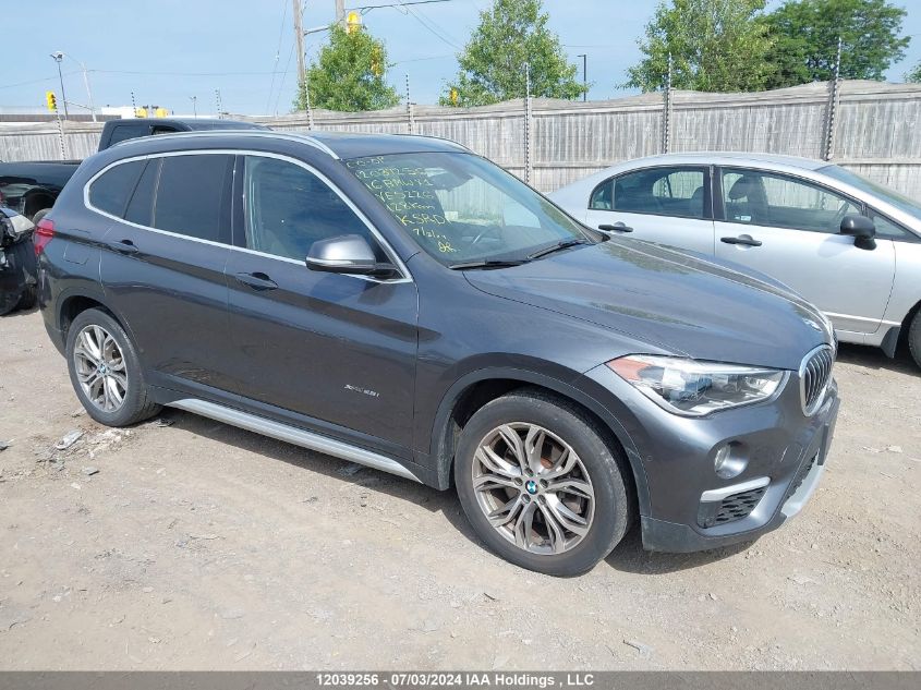 2016 BMW X1 VIN: WBXHT3C31G5E52267 Lot: 12039256