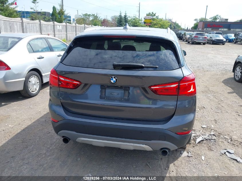 2016 BMW X1 VIN: WBXHT3C31G5E52267 Lot: 12039256