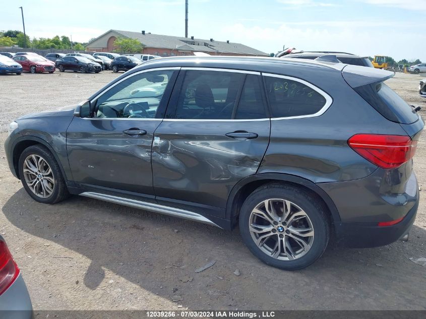 2016 BMW X1 VIN: WBXHT3C31G5E52267 Lot: 12039256