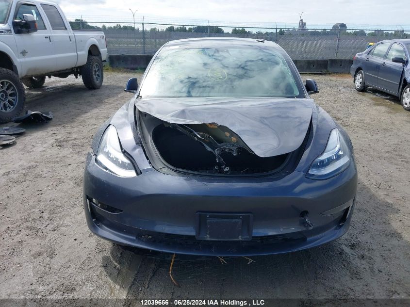 2022 Tesla Model 3 VIN: 5YJ3E1EB4NF277483 Lot: 12039656