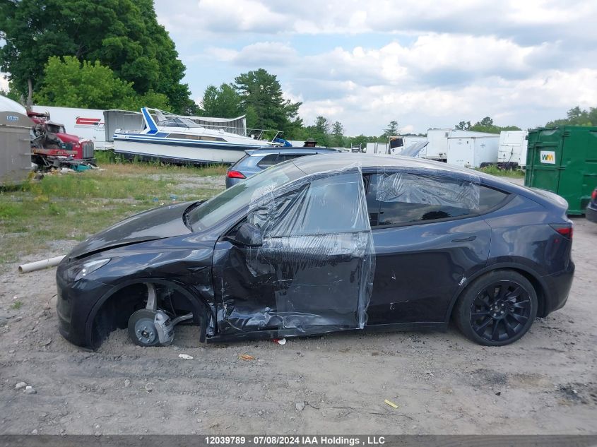 2024 Tesla Model Y VIN: 7SAYGDEE7RF080926 Lot: 12039789