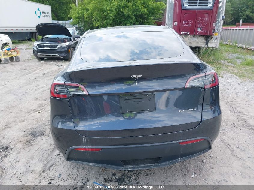 2024 Tesla Model Y VIN: 7SAYGDEE7RF080926 Lot: 12039789