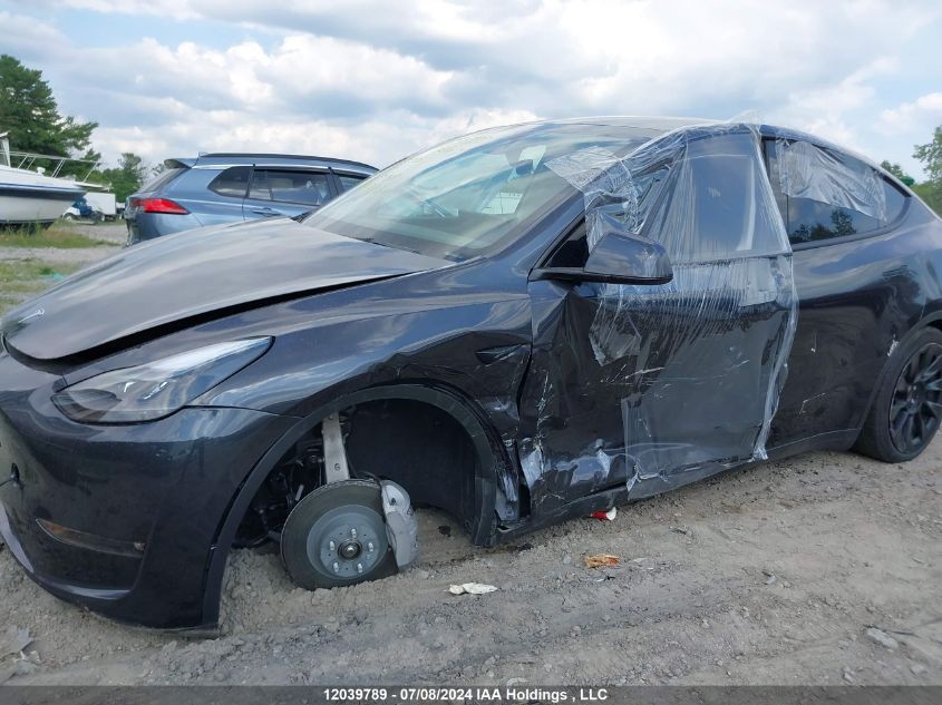 2024 Tesla Model Y VIN: 7SAYGDEE7RF080926 Lot: 12039789