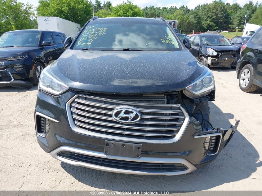 2017 Hyundai Santa Fe Se/Limited VIN: KM8SNDHF7HU214297 Lot: 12039908