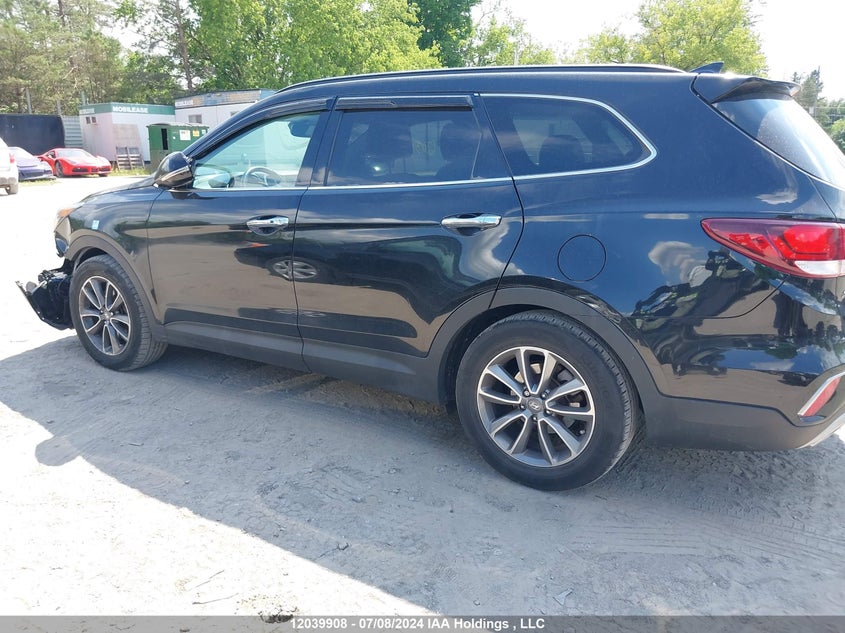 2017 Hyundai Santa Fe Se/Limited VIN: KM8SNDHF7HU214297 Lot: 12039908