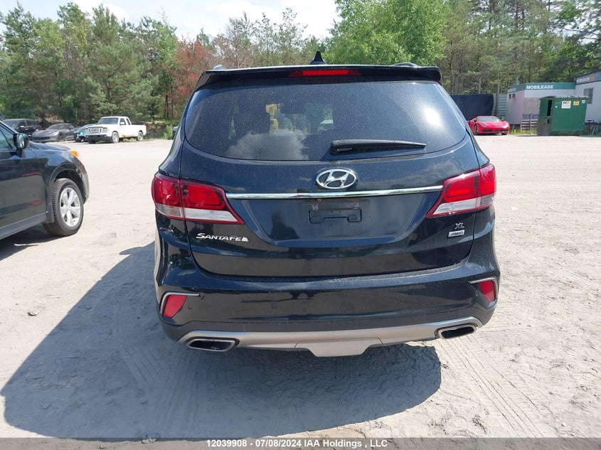 2017 Hyundai Santa Fe Se/Limited VIN: KM8SNDHF7HU214297 Lot: 12039908