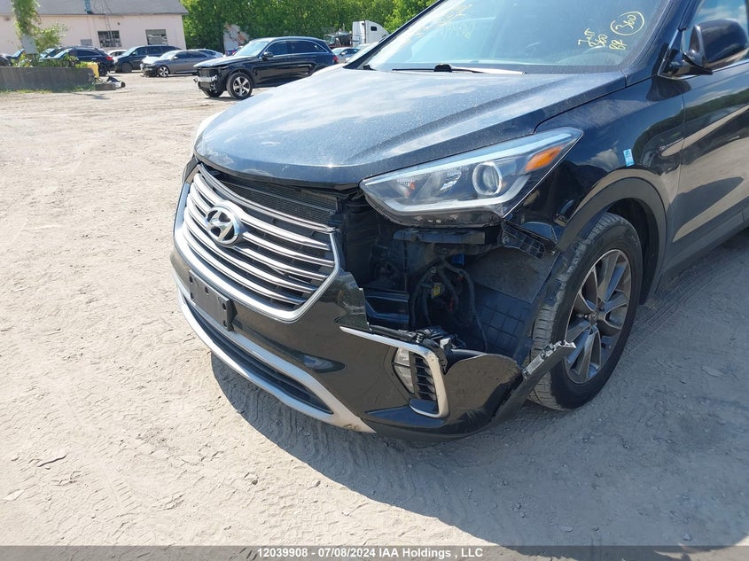 2017 Hyundai Santa Fe Se/Limited VIN: KM8SNDHF7HU214297 Lot: 12039908