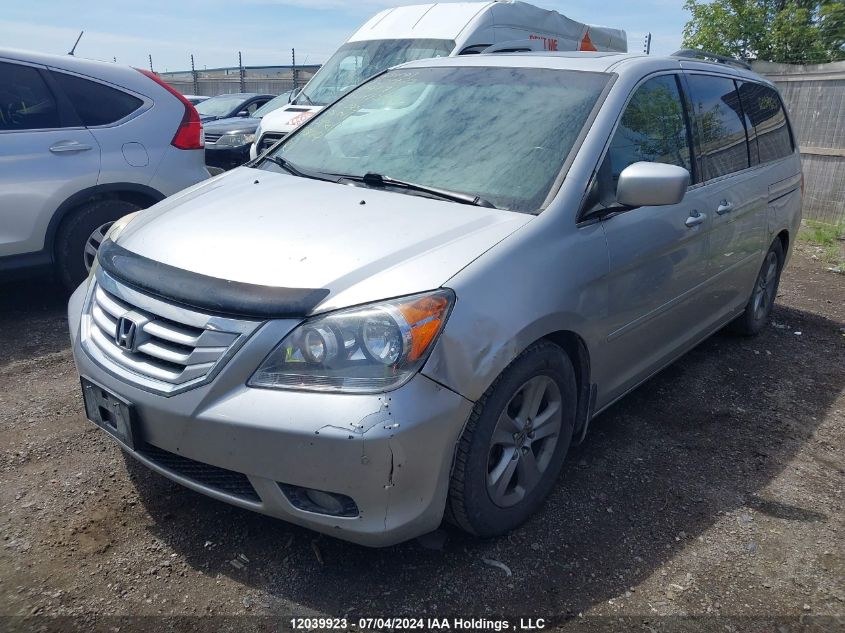 2010 Honda Odyssey Touring VIN: 5FNRL3H88AB504891 Lot: 12039923