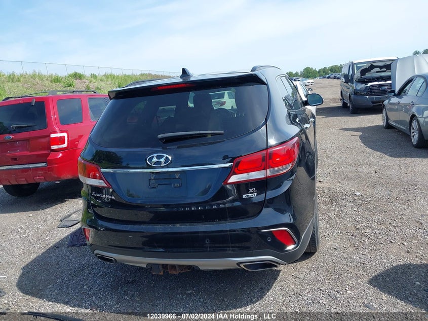 2017 Hyundai Santa Fe Se/Limited VIN: KM8SNDHF3HU180343 Lot: 12039966