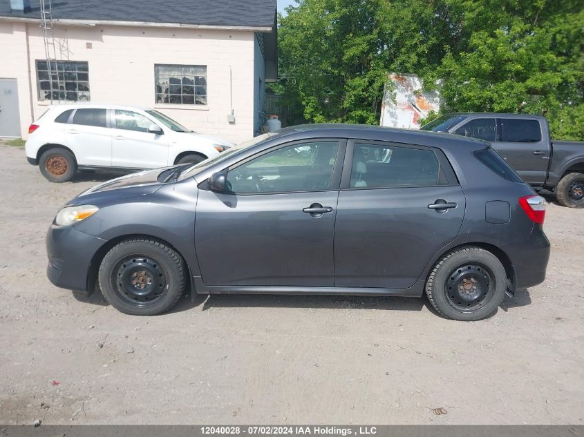 2009 Toyota Matrix Xr VIN: 2T1KE40E99C006945 Lot: 12040028