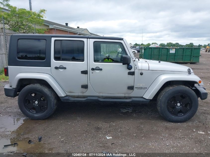 2007 Jeep Wrangler Unlimited Sahara VIN: 1J4GA59147L128264 Lot: 12040134