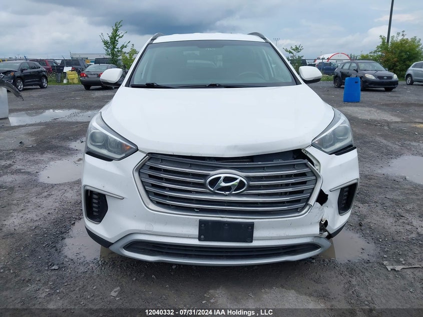 2017 Hyundai Santa Fe Se/Limited VIN: KM8SNDHF7HU173394 Lot: 12040332