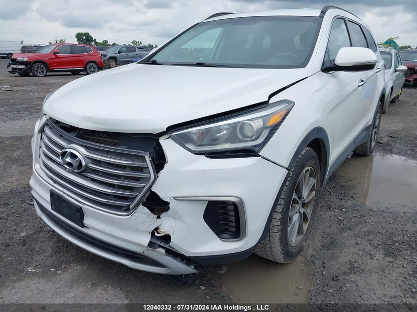 2017 Hyundai Santa Fe Se/Limited VIN: KM8SNDHF7HU173394 Lot: 12040332