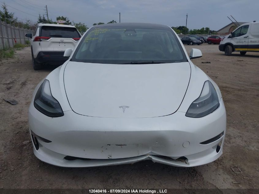 2023 Tesla Model 3 VIN: 5YJ3E1EA1PF498677 Lot: 12040416