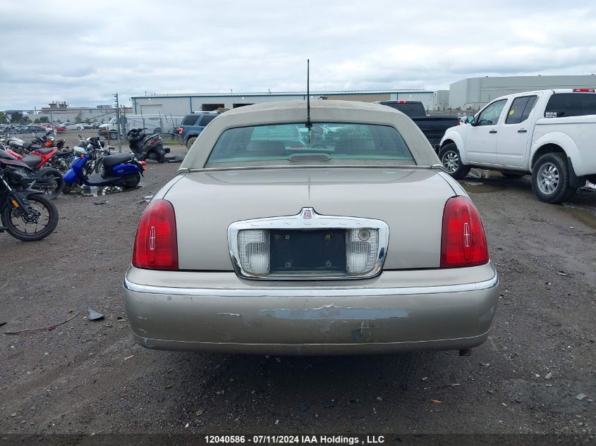 2000 Lincoln Town Car VIN: 1LNHM82W7YY791532 Lot: 12040586