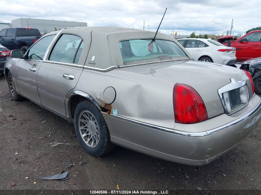 2000 Lincoln Town Car VIN: 1LNHM82W7YY791532 Lot: 12040586