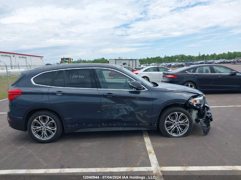 2018 BMW X1 VIN: WBXHT3C31J3H32936 Lot: 12040944