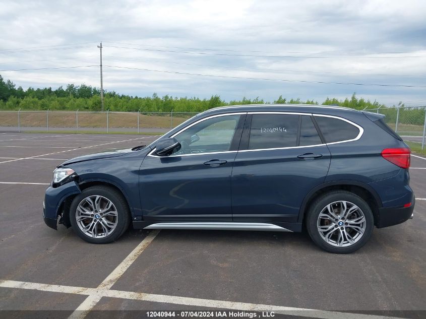 2018 BMW X1 VIN: WBXHT3C31J3H32936 Lot: 12040944