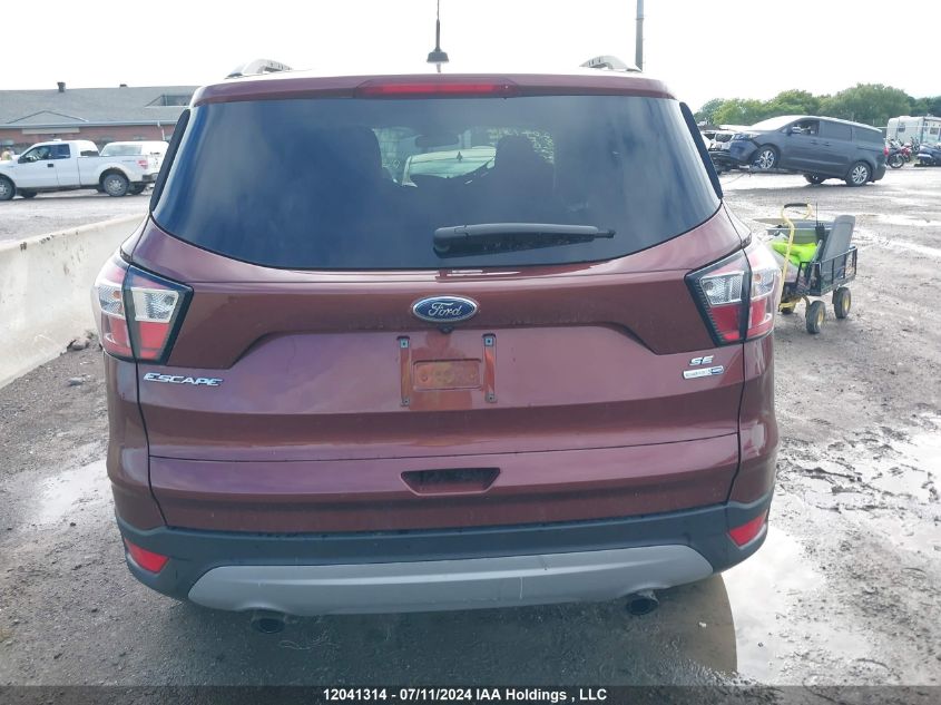 2018 Ford Escape Se VIN: 1FMCU9GD8JUB91607 Lot: 12041314