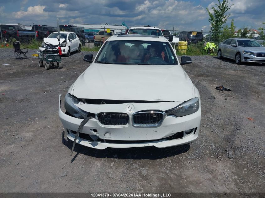 2014 BMW 3 Series VIN: WBA3C3C59EF985879 Lot: 12041370