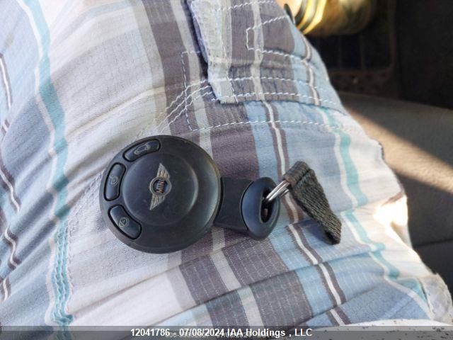 2010 Mini Cooper Hardtop VIN: WMWMF3C55ATZ23354 Lot: 12041786