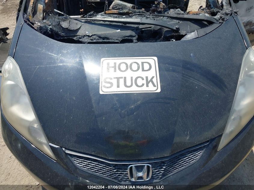 2009 Honda Fit VIN: JHMGE87359S804650 Lot: 12042204